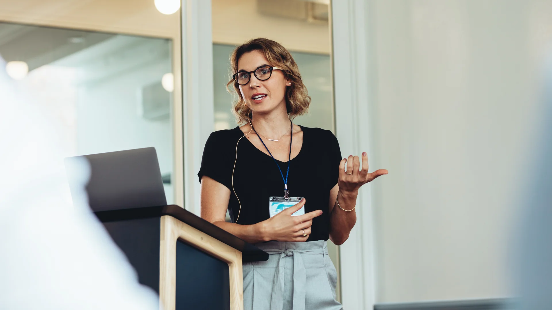 Businesswoman delivering a speech during a conference