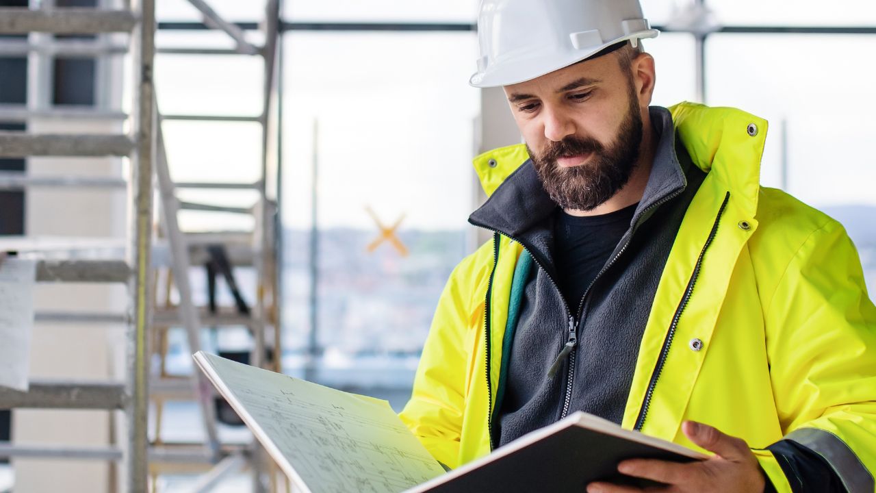Construction worker reading