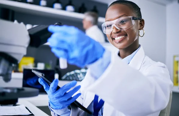 scientist with device