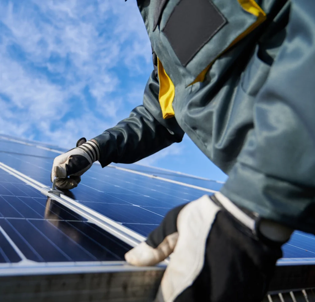 man on solar panel