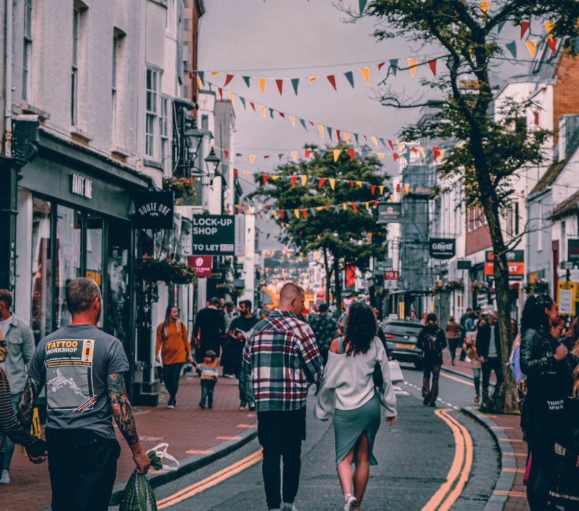 people walking on pedestrian lane during daytime in Brighton