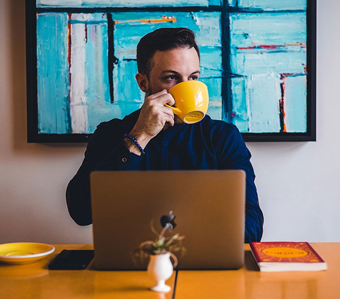 busines person drinks coffee