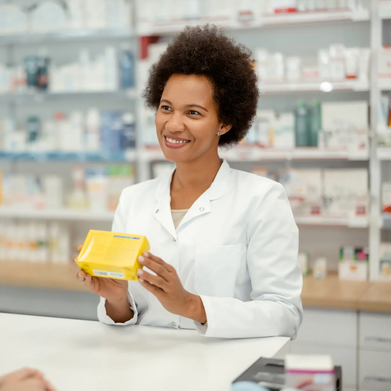 pharmacy dispenser handling medication