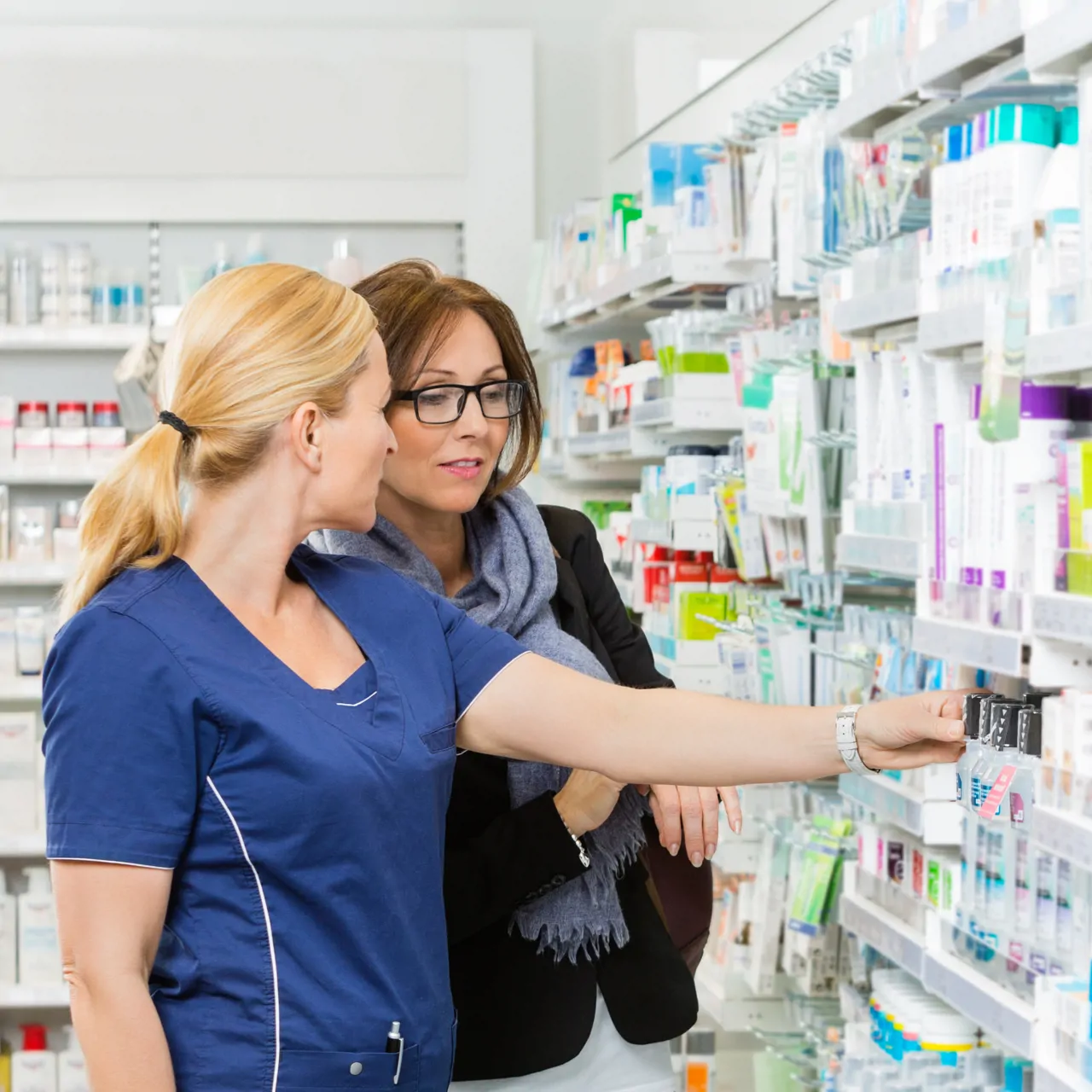 Pharmacy technician working in a community pharmacy