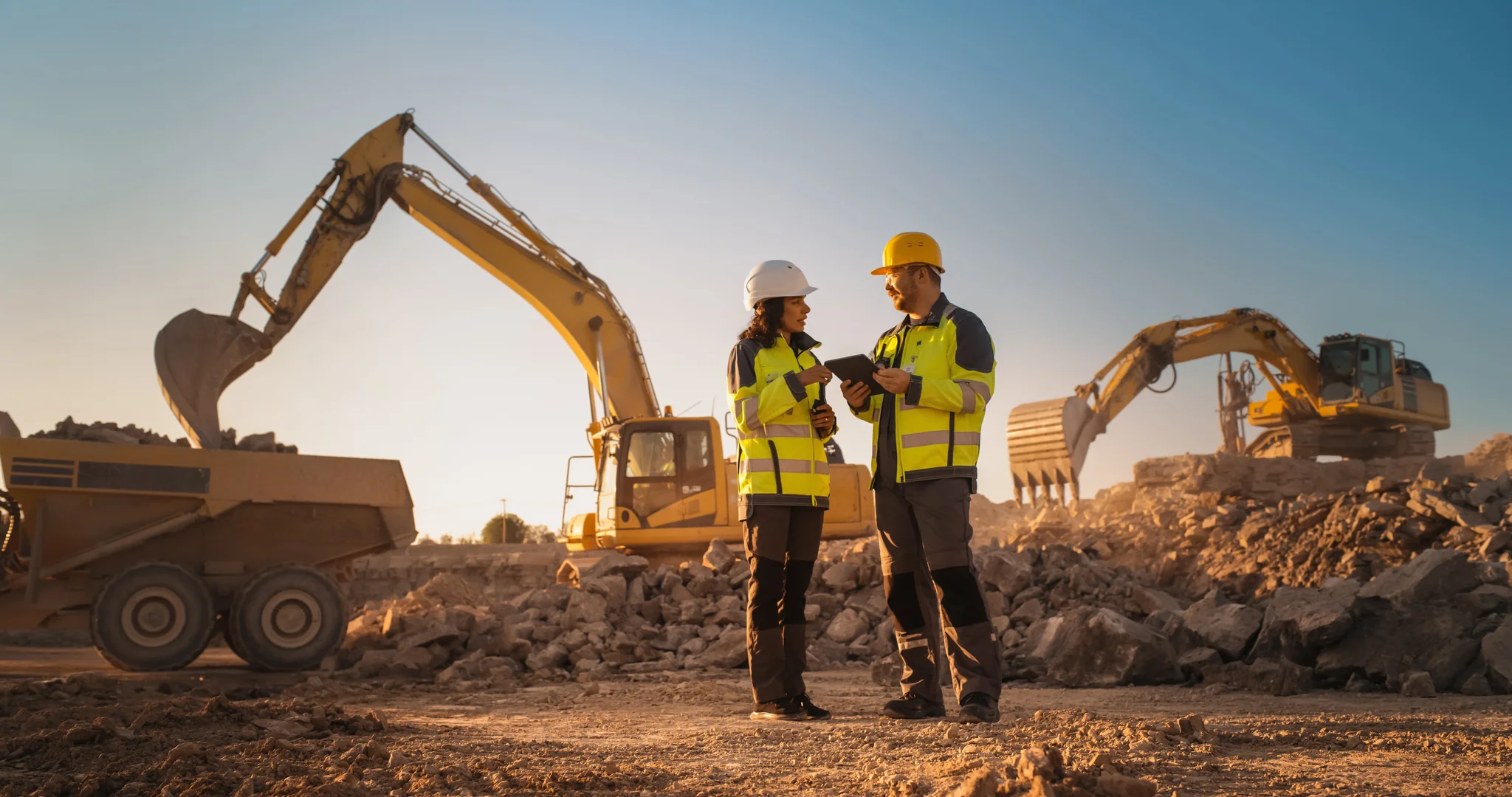 two people at a construction site
