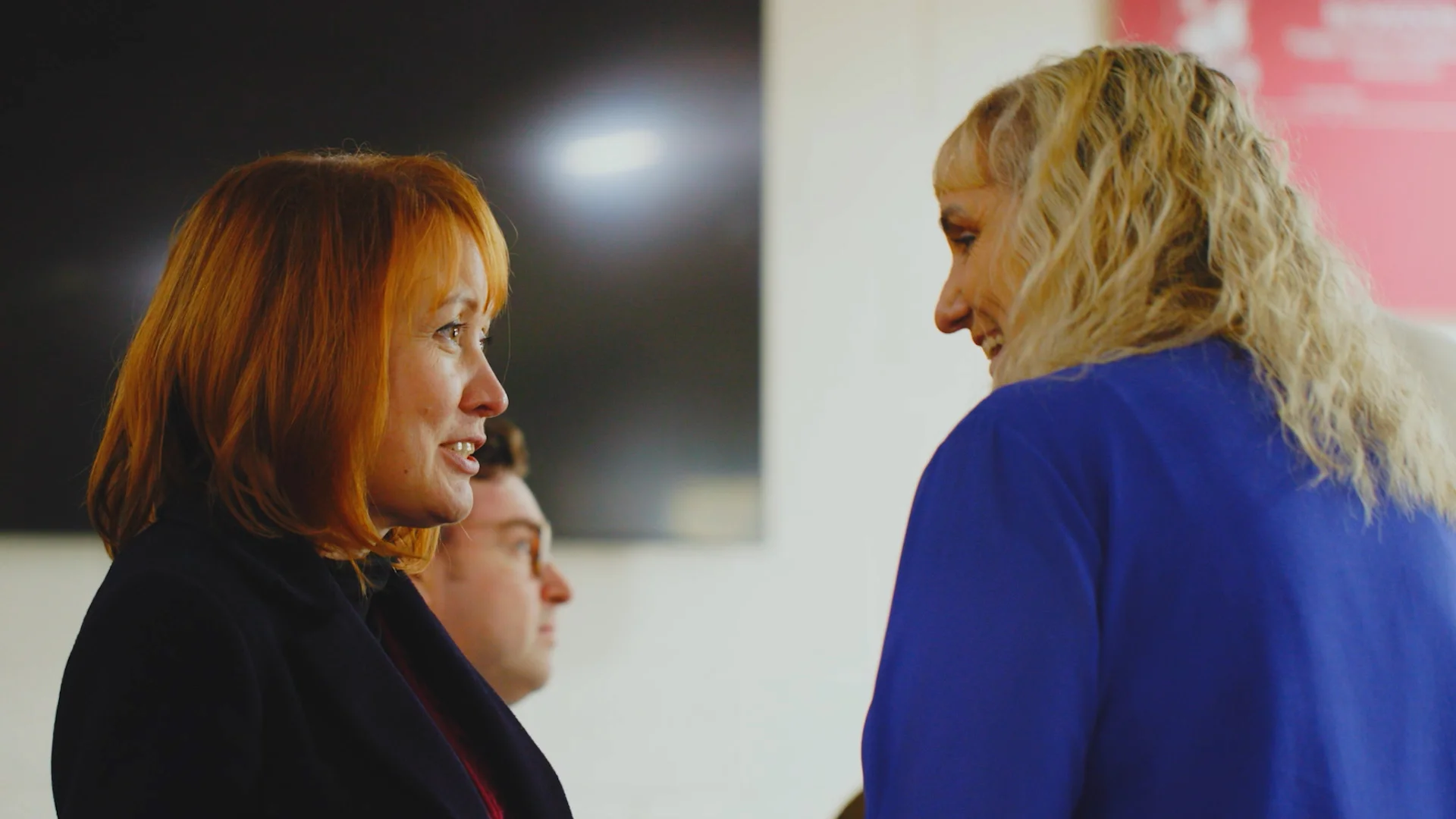 two women speaking
