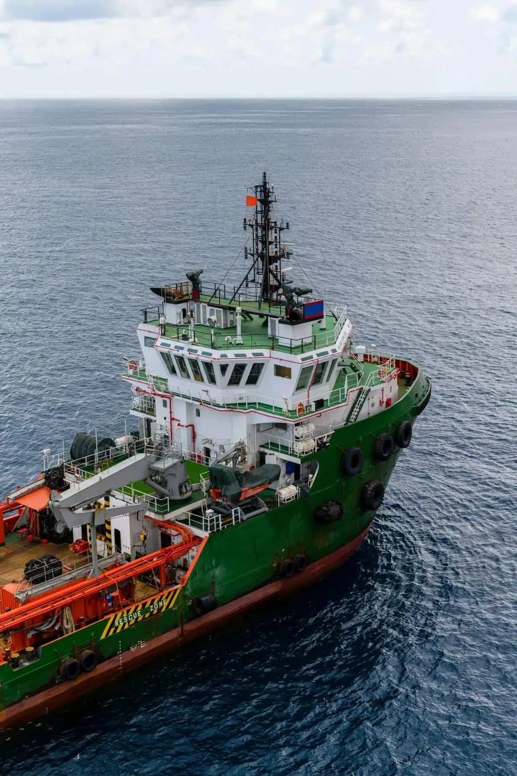 green vessel in ocean