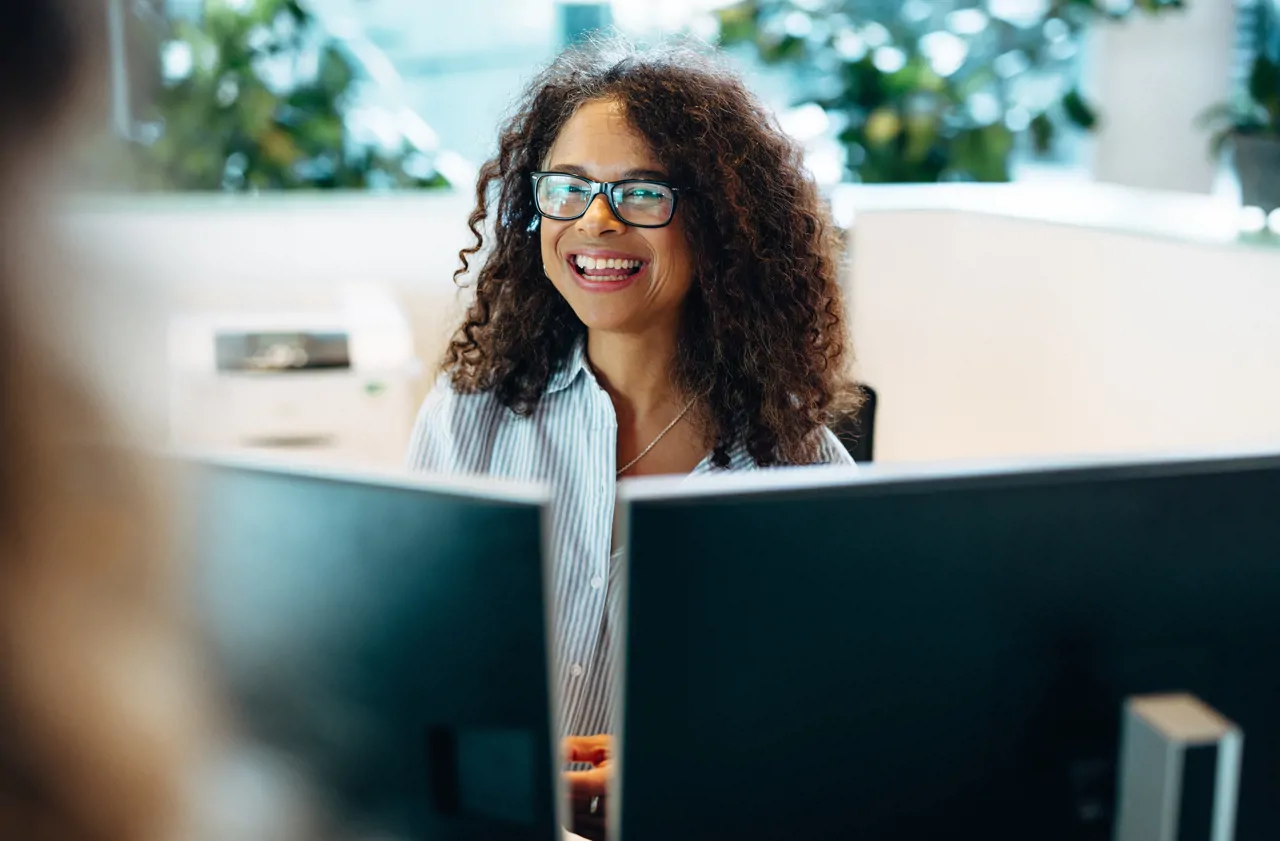 Smiling woman working municipality office reception 