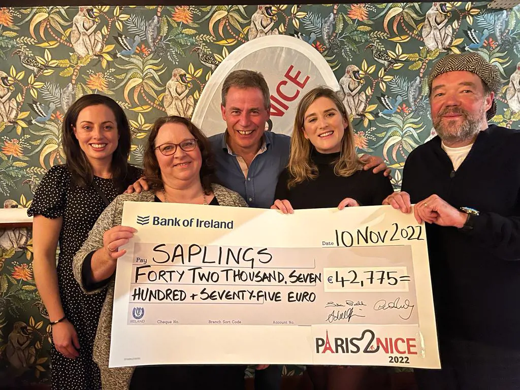 Image of Sigmar staff presenting cheque to the management team of Saplings Special School Goresbridge
