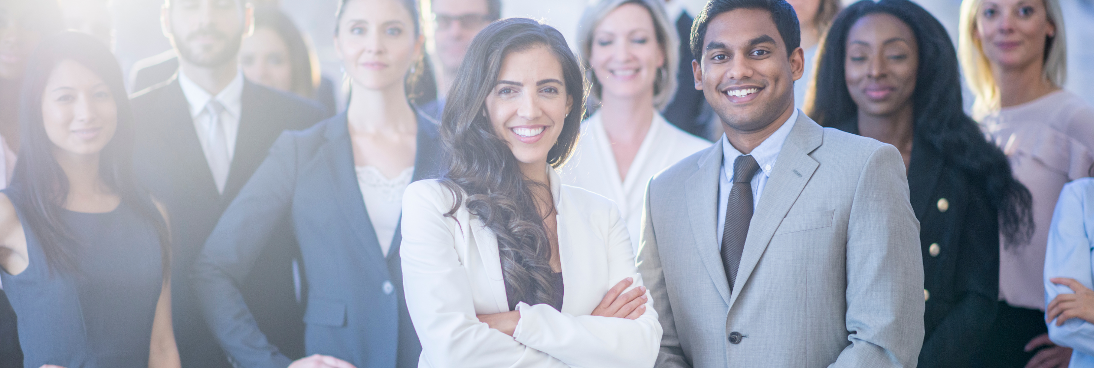 Finance professionals all looking at the camera