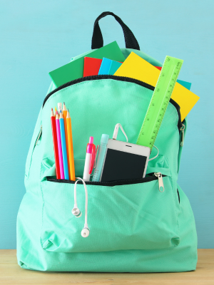 A backpack filled with stationery