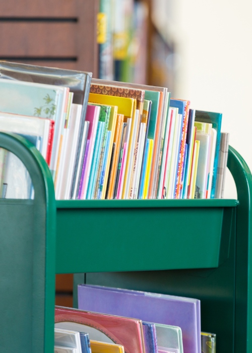 Library books on a trolley in a school