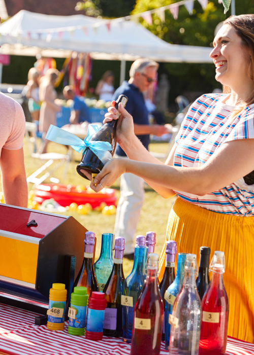 A lady at a school fete tombola