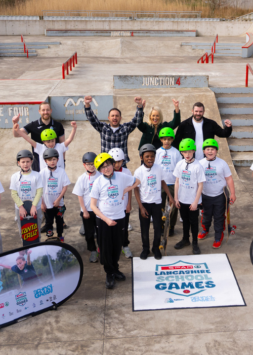 SCG employees with school children at a skate park