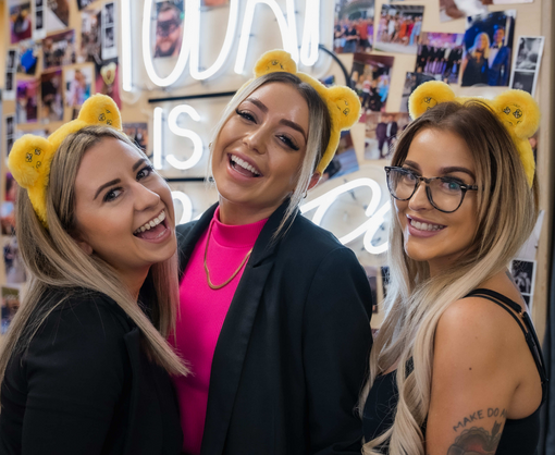 Spencer Clarke Group employees wearing yellow teddy ears for Children In Need