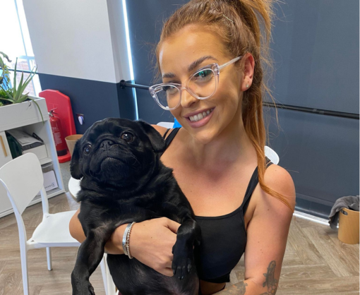 Georgia Parkinson with a pug dog