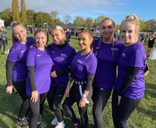 Taylor Kirkham with colleagues at Tough Mudder 