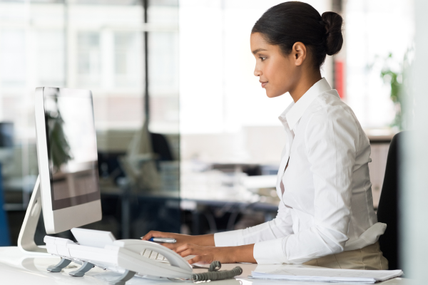 A female professional at their desk