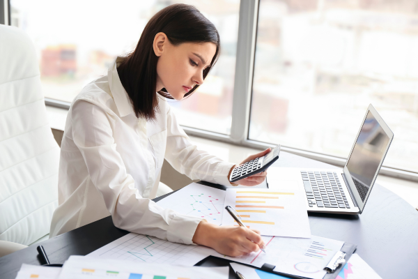 A woman working at her computer