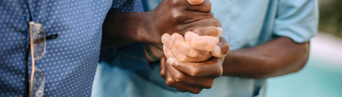 Hands holding together