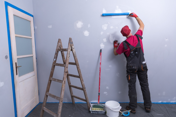 A man painting a wall