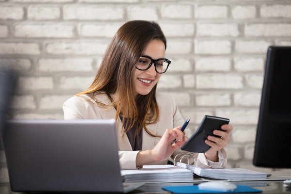 A lady using a calculator