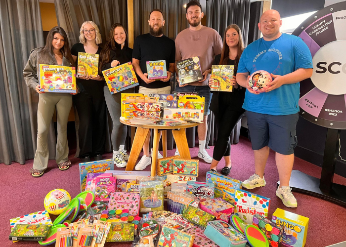 Education team with toys donated to Homestart, Blackpool, Fylde and Wyre