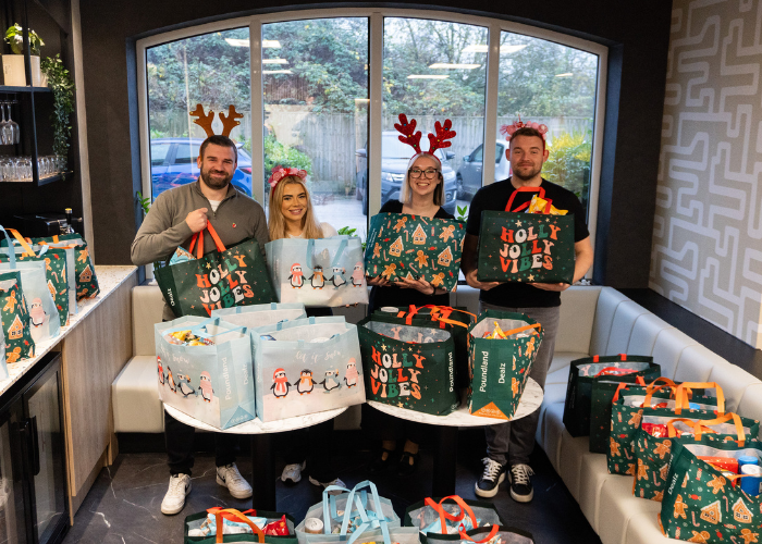 SCG education team with a collection of food hampers for Christmas