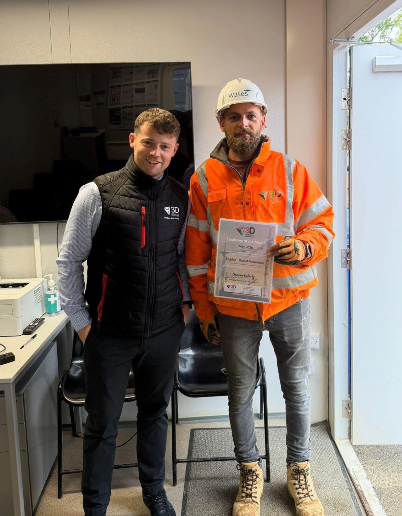 Nathan after presenting Bogdan with his award at the Horton Heath site office