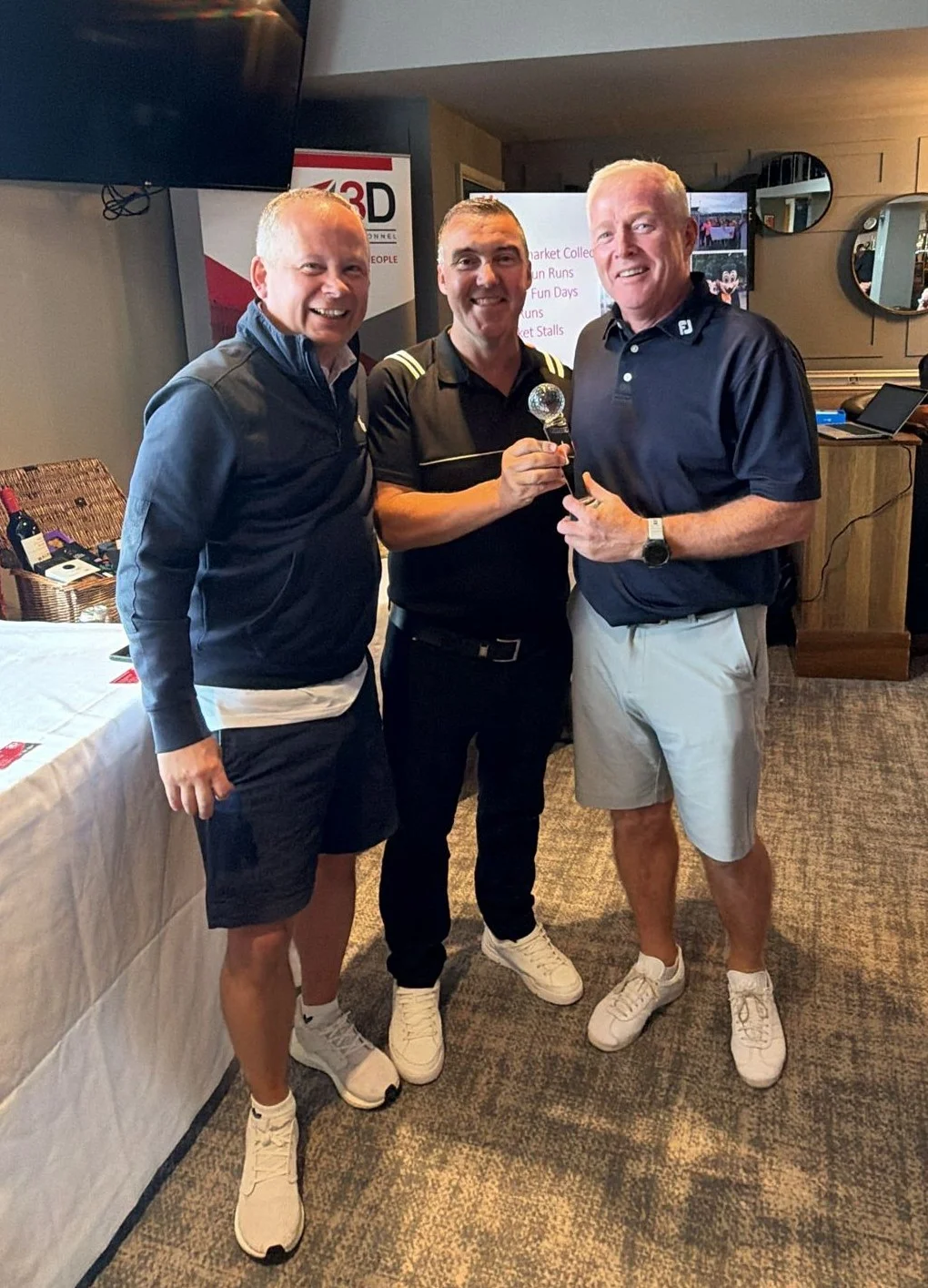 The 2026 Individual Winner - Phil right receives his trophy from Damian and Andy