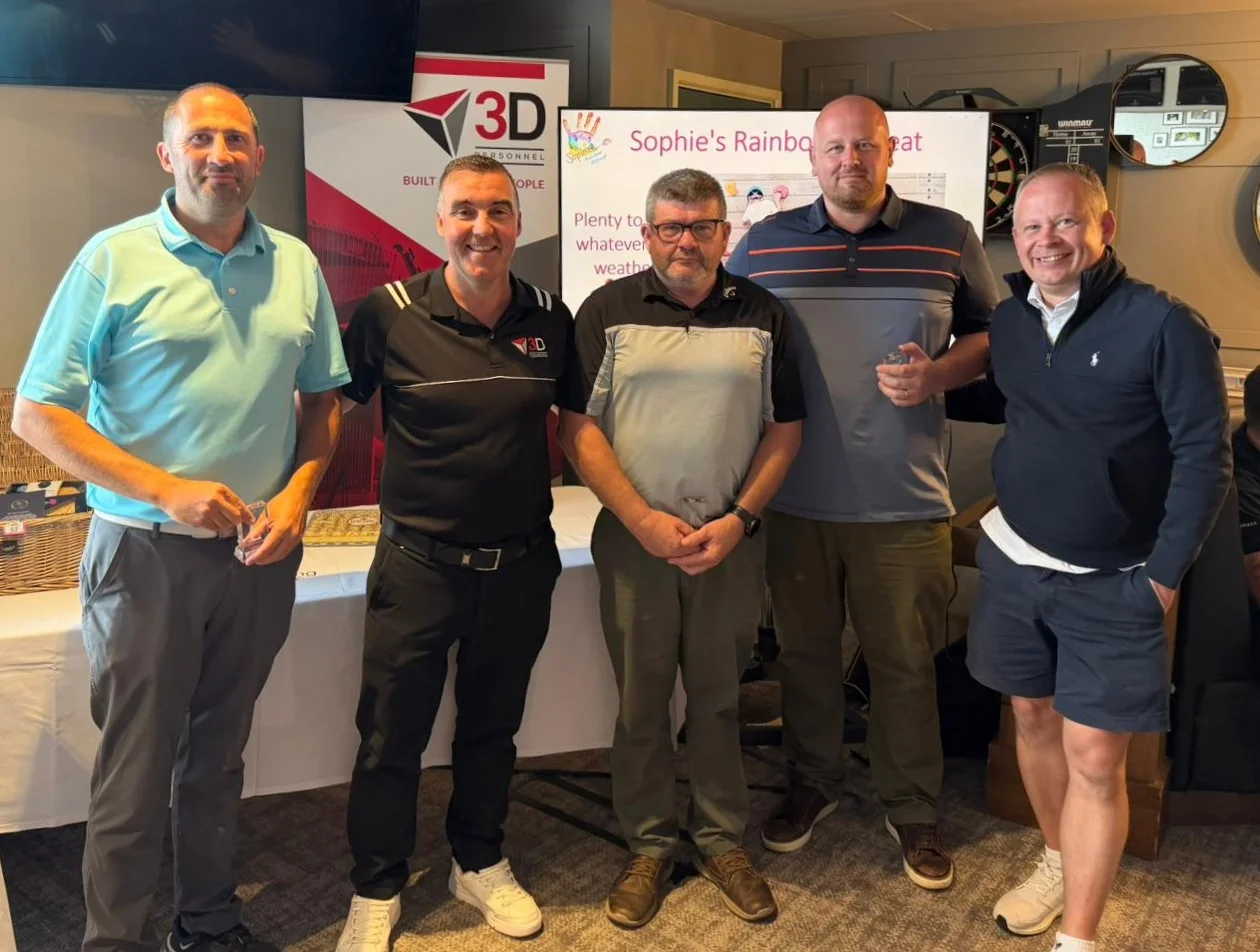 The 2026 Team Runners Up - Members from the Knights Brown team collect their trophies from Damian and Andy