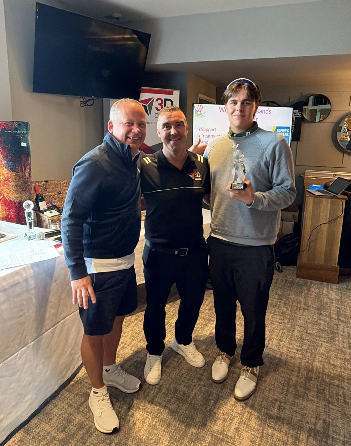 2026 Individual second place - Owen collects the trophy from Damian on behalf of Andy