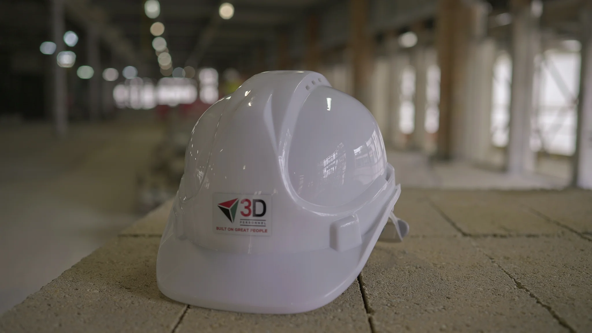 3D Personnel hard hat on bale of blocks