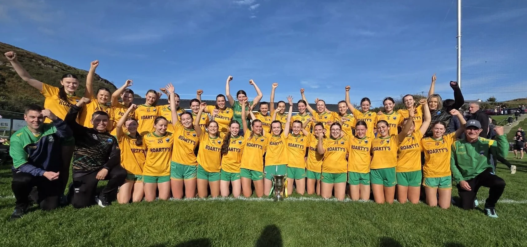 The victorious Naomh Columba LGFA team after their 2026 Championship win