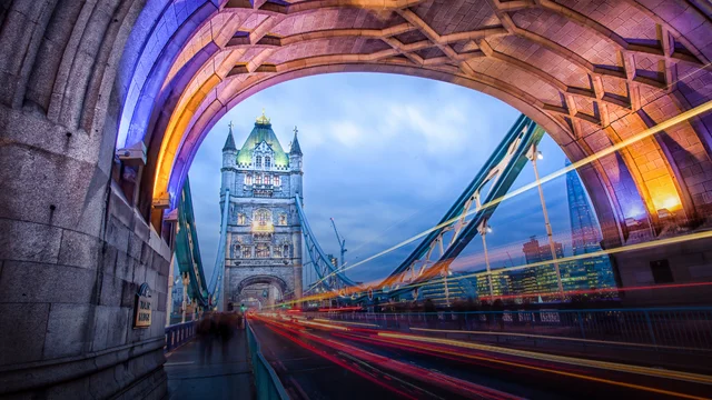 Image of Tower Bridge in London, with light trails on the right caused by cars passing by