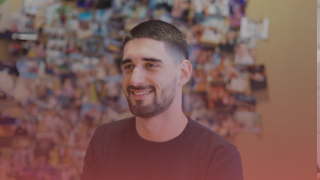 Male recruitment consultant smiling off into the distance