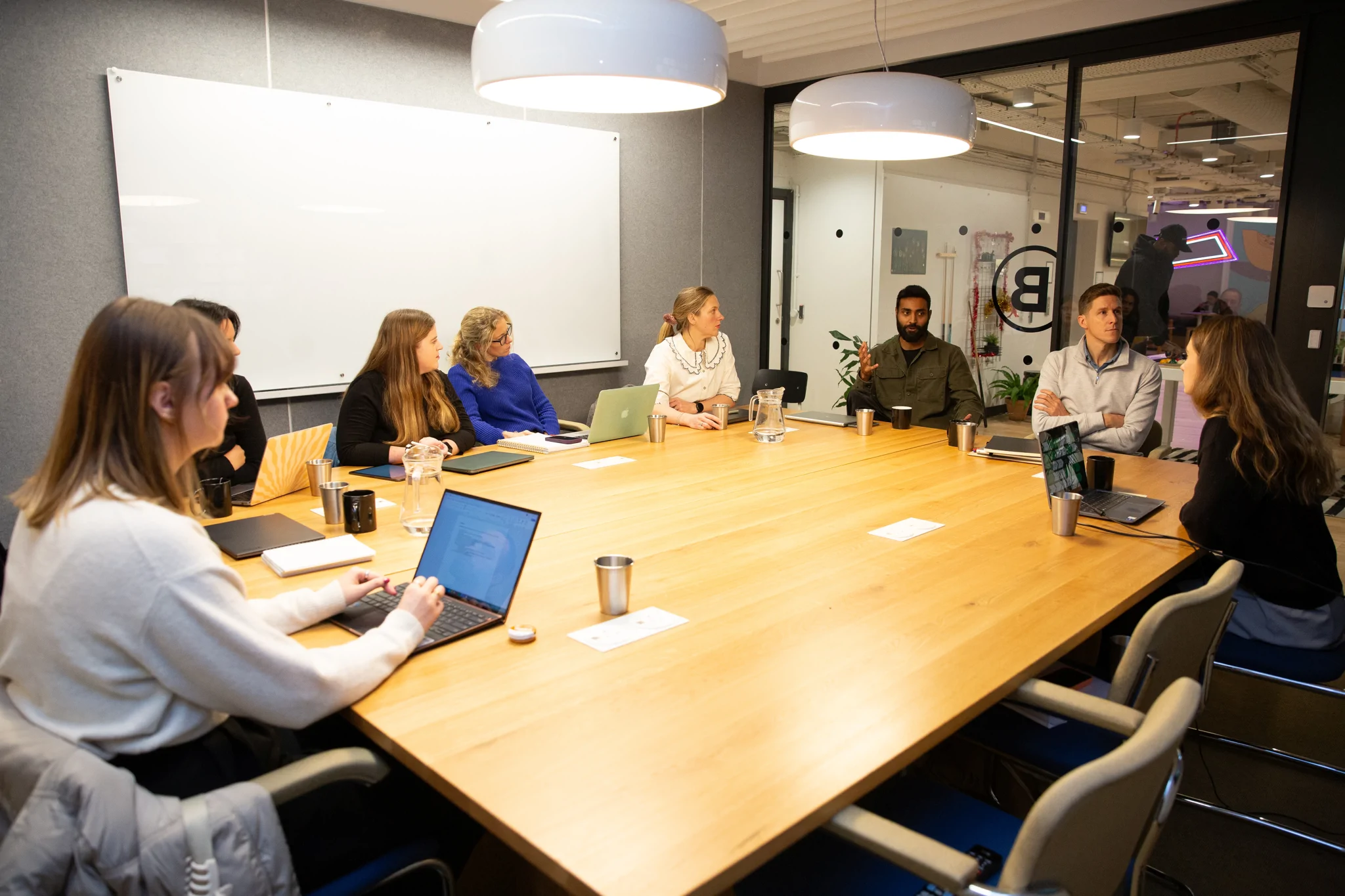 Zanda team around large meeting table