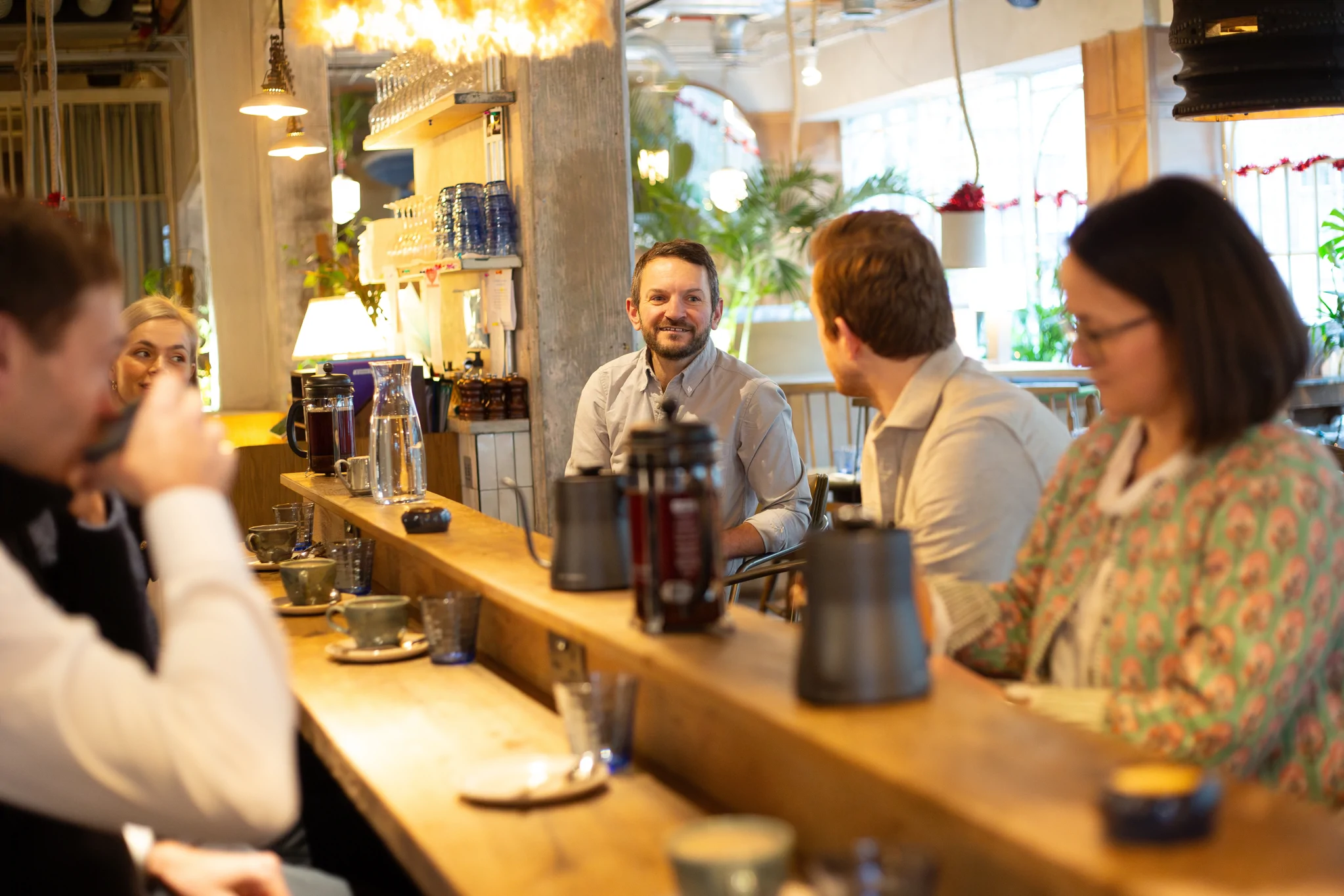 People drinking coffee and chatting