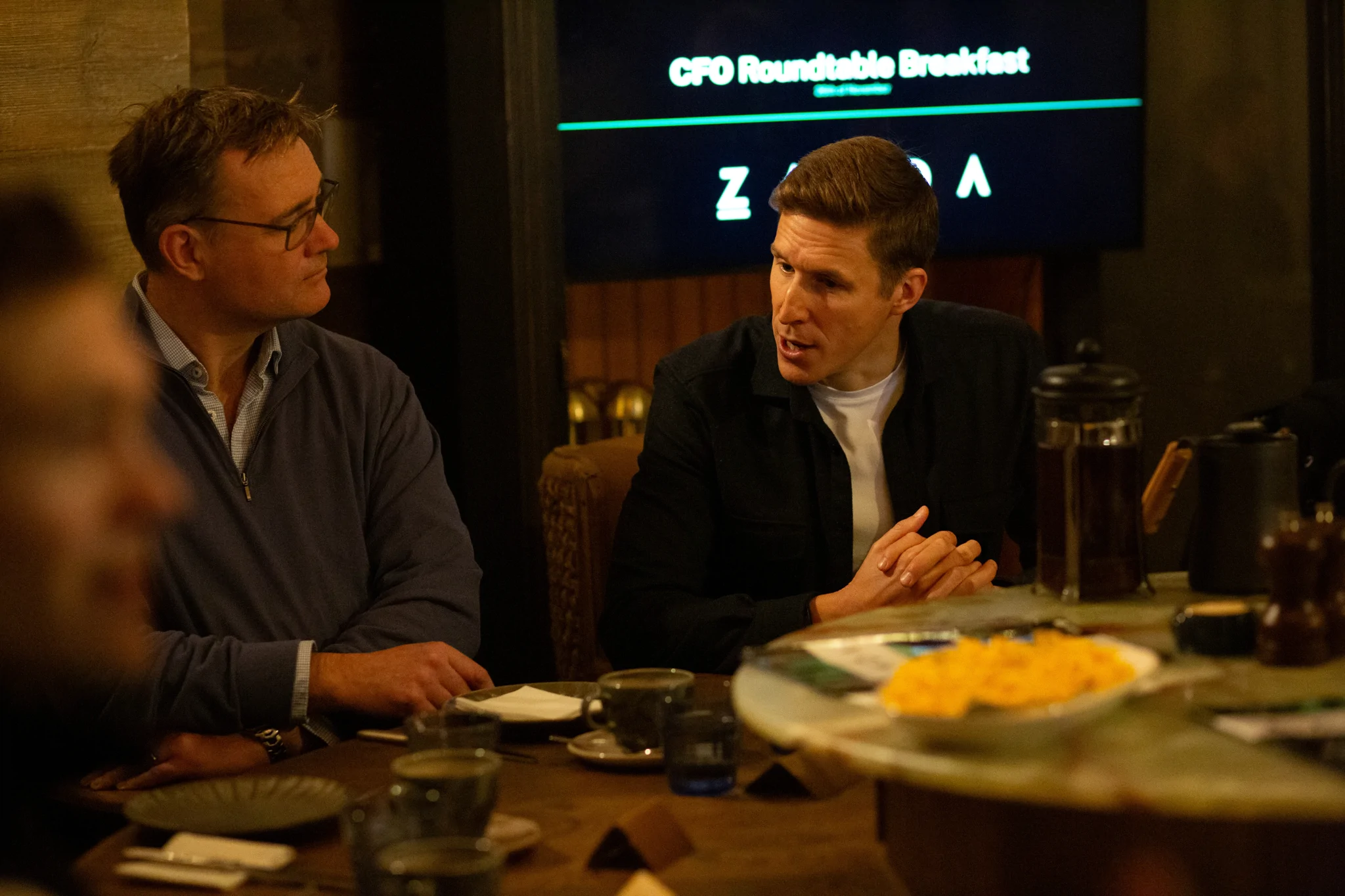 Recruiter talking closely with a fractional CFO