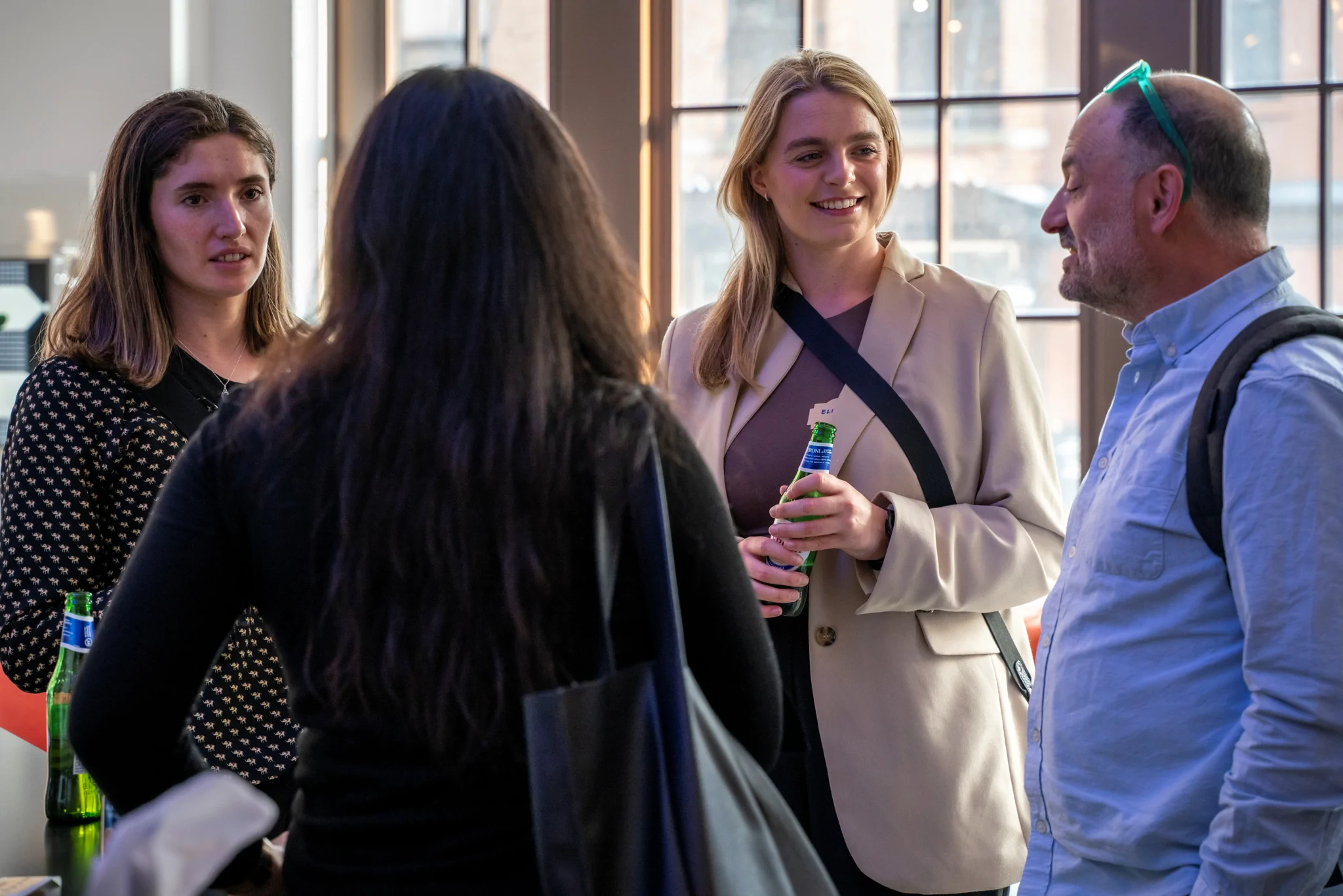 People chatting at an event